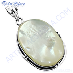 Load image into Gallery viewer, 925 sterling silver pendant with a large, oval-shaped mother of pearl gemstone, shimmering with iridescence.
