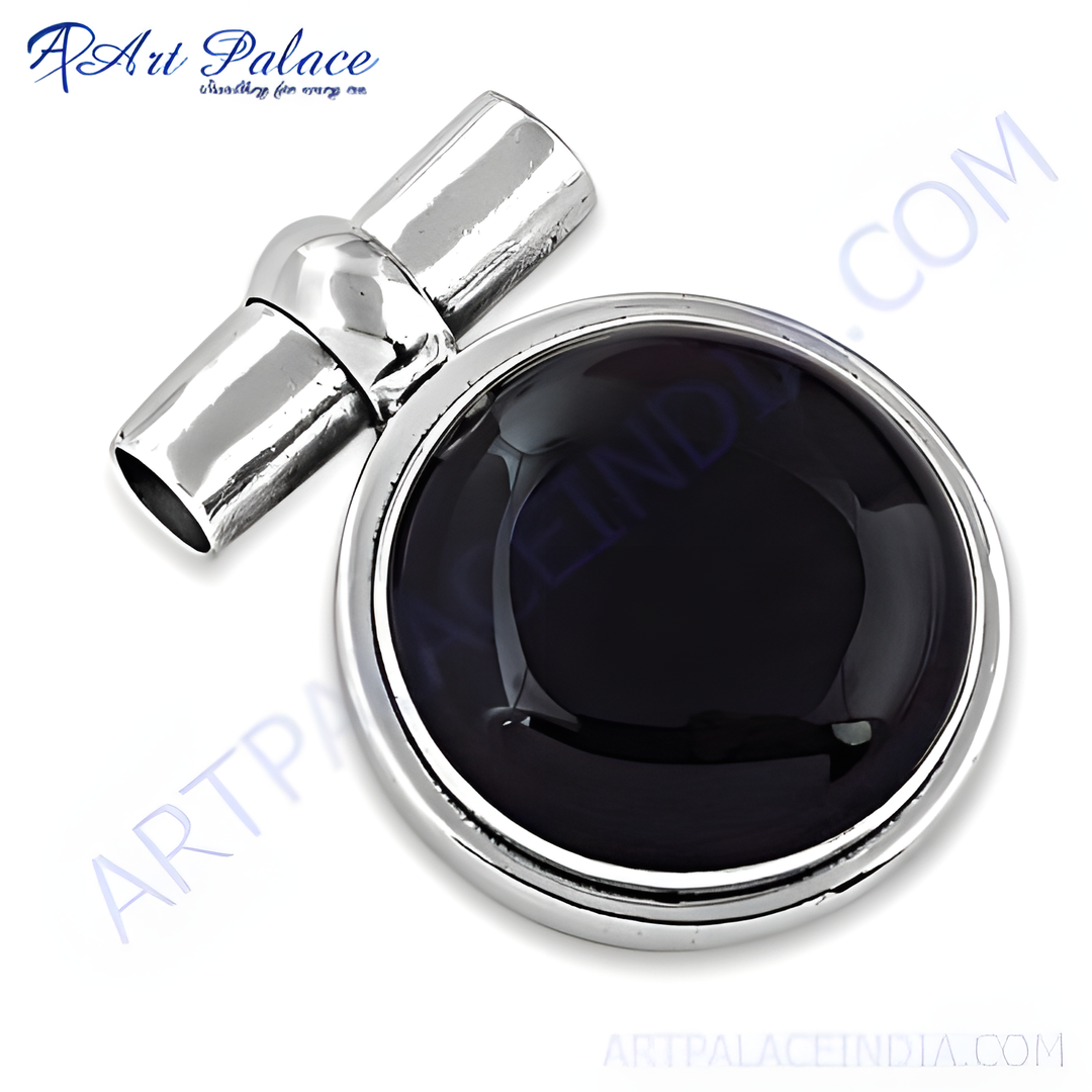 Sterling silver cufflinks featuring a black onyx gemstone, perfect for men's formal attire.