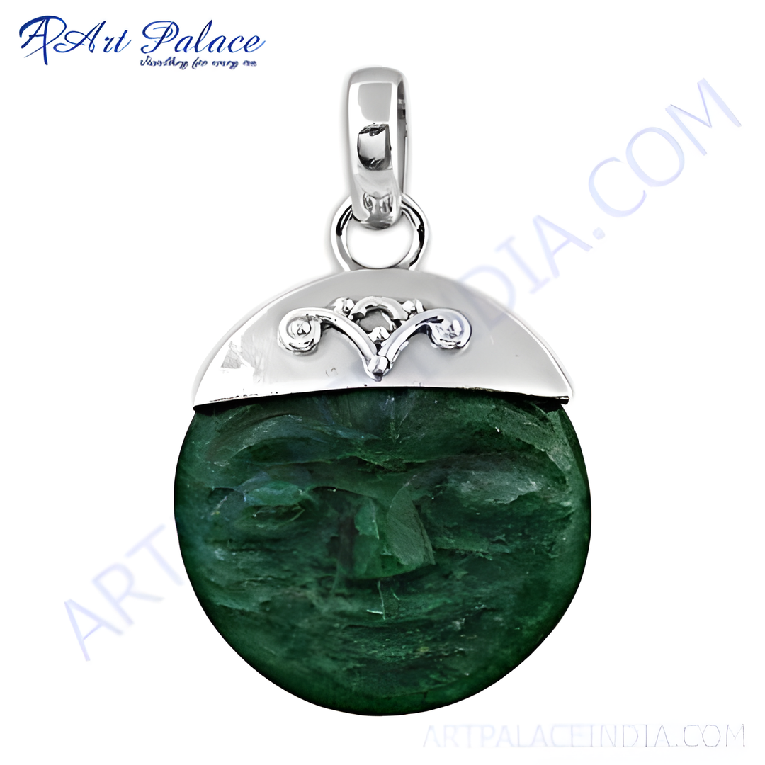 Sterling silver pendant with carved green jade face. A unique, artistic jewelry piece.
