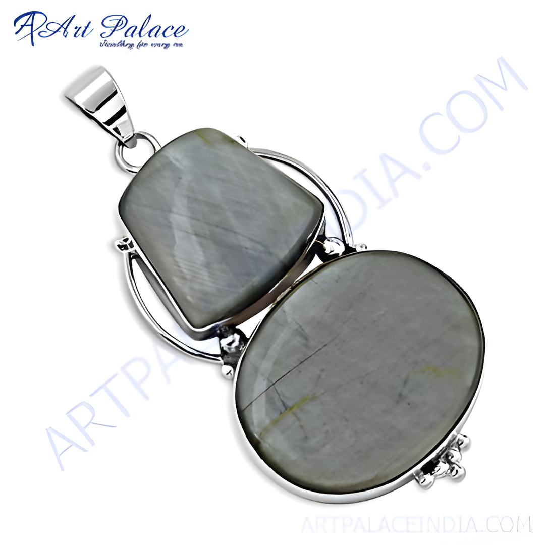 Sterling silver pendant with two grey cat's eye gemstones, perfect for a necklace. Silver jewelry