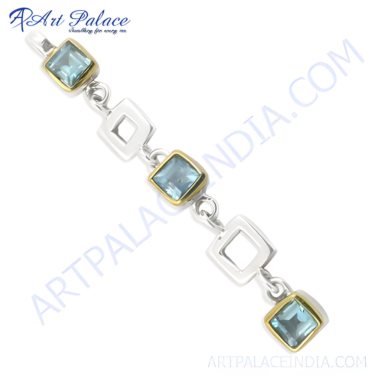 Sterling silver chain bracelet with blue topaz gemstones and gold plating accents, elegant design