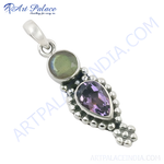 Load image into Gallery viewer, Sterling silver pendant featuring a labradorite stone and a purple amethyst stone.
