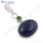 Load image into Gallery viewer, Sterling silver pendant with a large oval blue gemstone and a smaller green stone accent, perfect for women.
