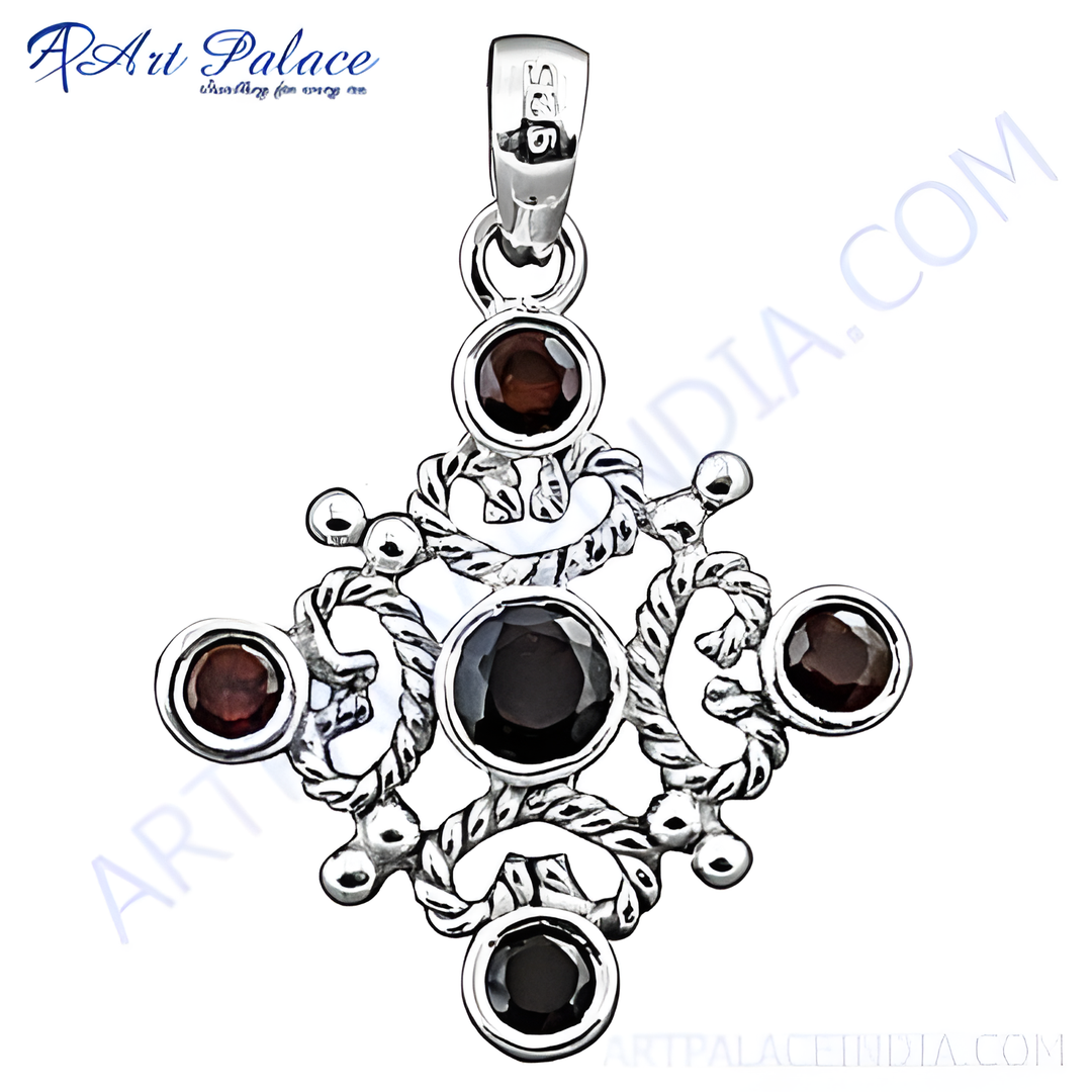 925 sterling silver charm pendant with round-cut red garnet gemstones. This intricate design is perfect for gifting.