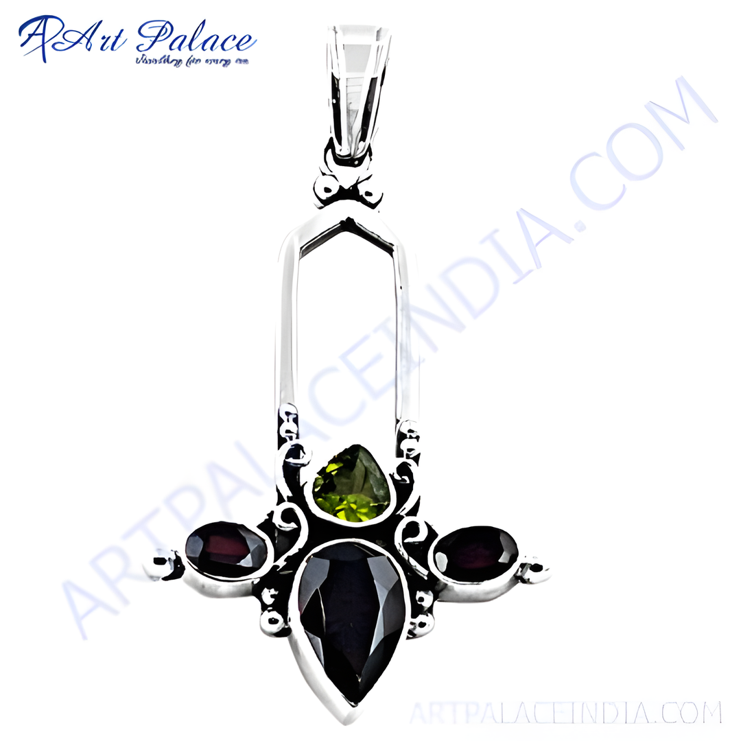 925 sterling silver pendant with pear-shaped garnet, peridot, and oval garnet accents.