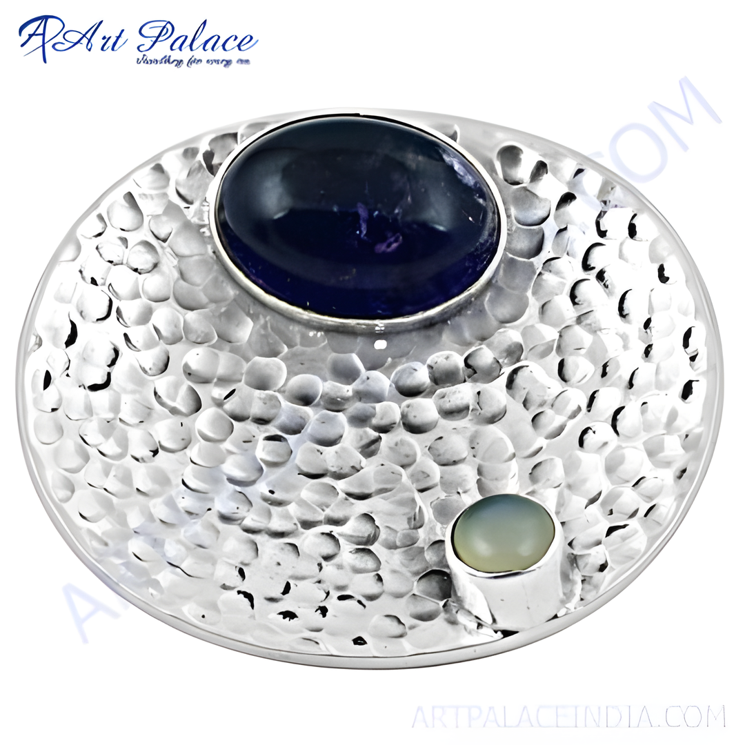925 sterling silver hammered ring with a large blue gemstone and a smaller green stone.