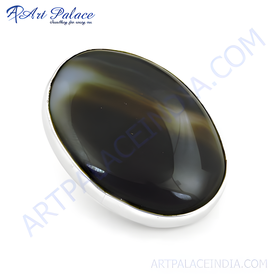 Sterling silver ring with a large, polished oval-shaped black onyx gemstone set against a white background.
