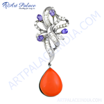 Load image into Gallery viewer, Silver pendant with orange coral teardrop and tanzanite accents, a beautiful gemstone jewelry piece.
