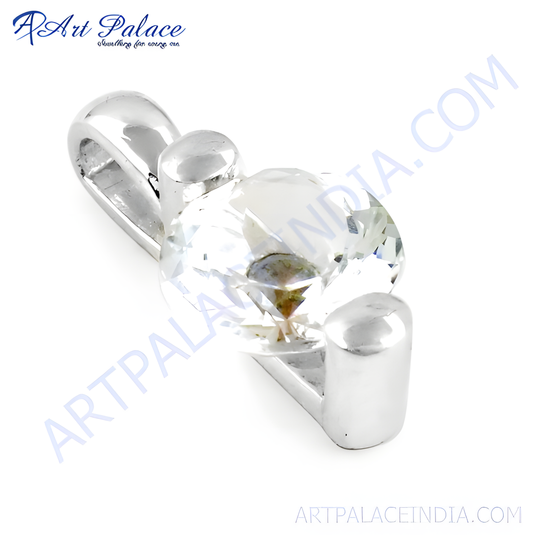 Silver pendant with large, clear crystal gemstone, showcasing a sparkling, elegant design.