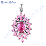 Load image into Gallery viewer, Sterling silver pendant with a large pink gemstone center and smaller pink stones surrounding it.
