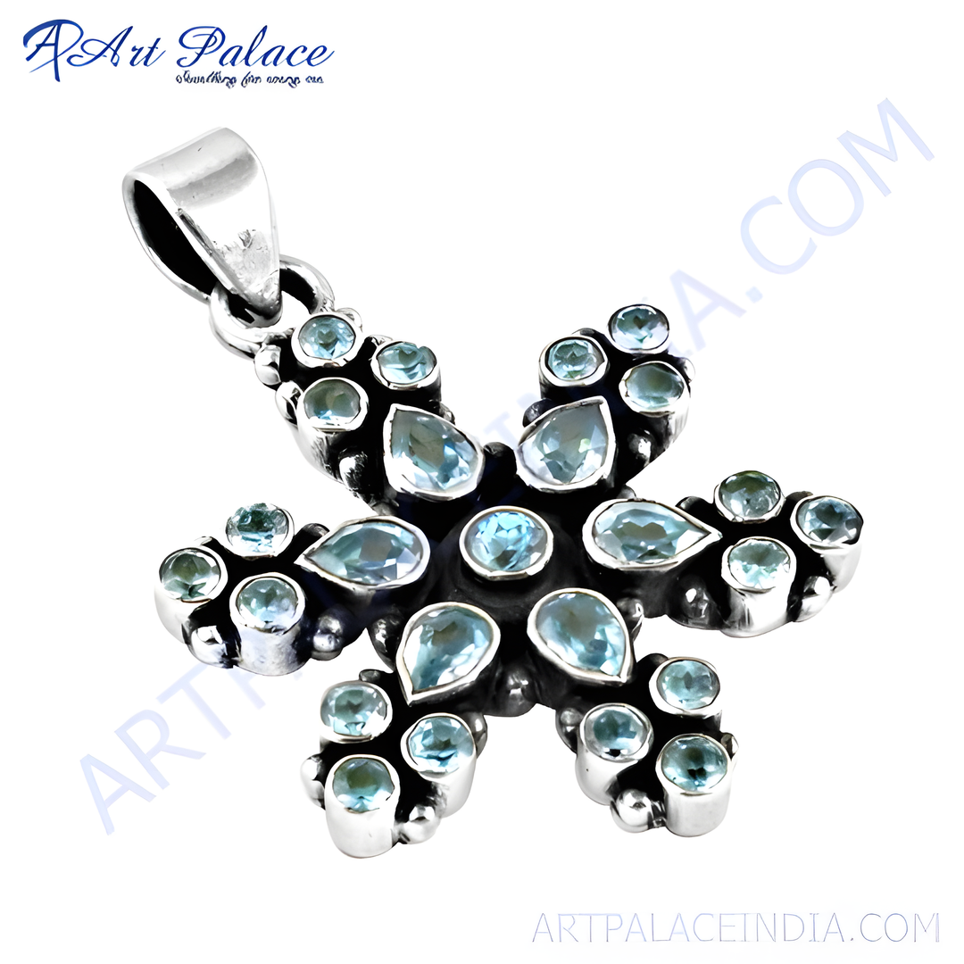 Sterling silver flower pendant with vibrant blue topaz gemstones, perfect for women.