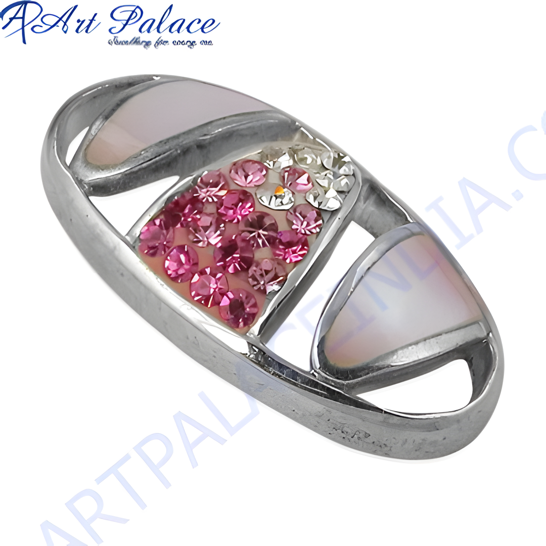 Silver pendant with pink crystals and shimmering accents. A unique and elegant charm.