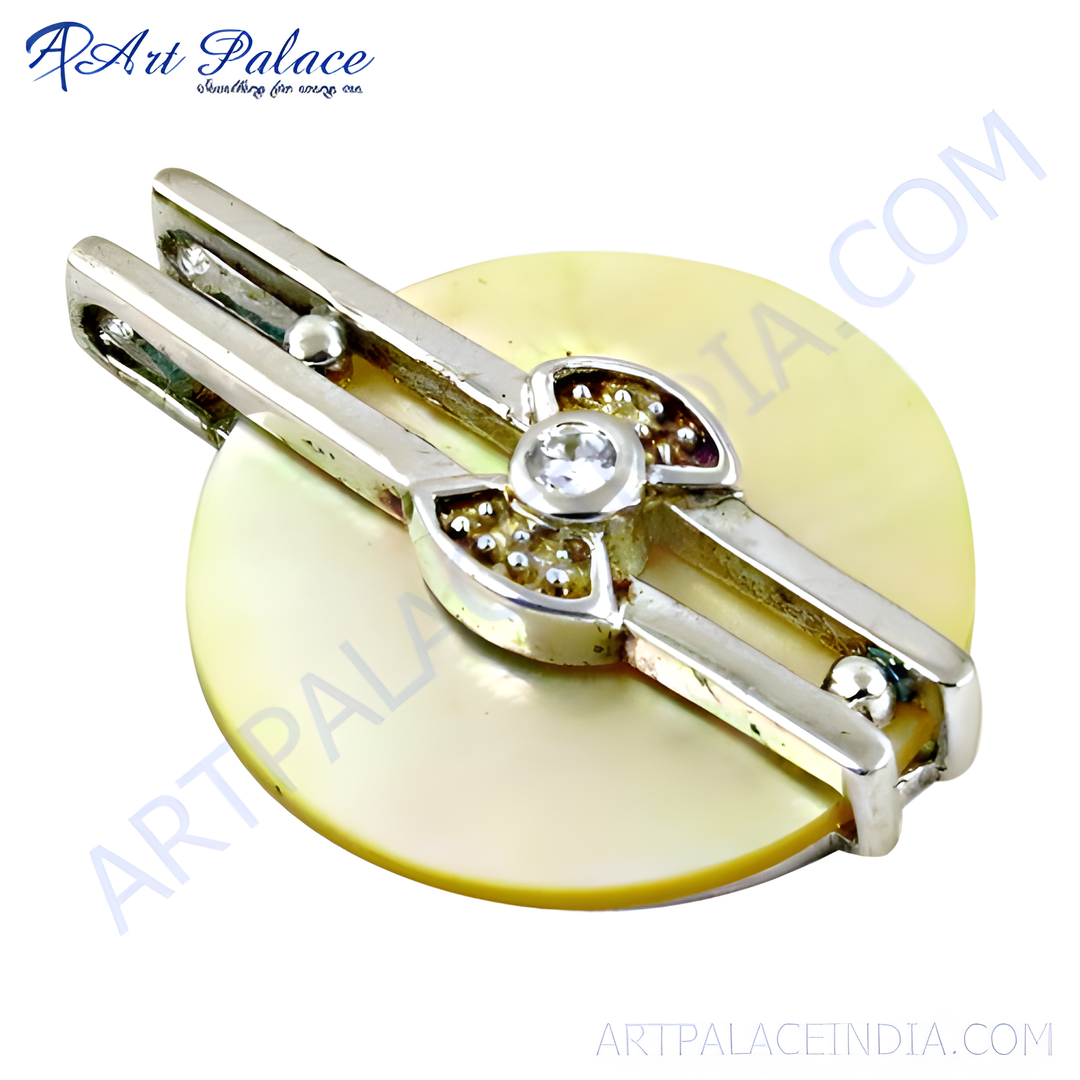 Silver pearl pendant with CZ stones. A circular pearl base with a silver and CZ design.