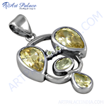 Load image into Gallery viewer, 925 sterling silver citrine pendant, featuring pear-shaped yellow gemstones.
