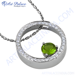 Load image into Gallery viewer, Sterling silver peridot halo pendant necklace, featuring a vibrant green gemstone with silver chain.
