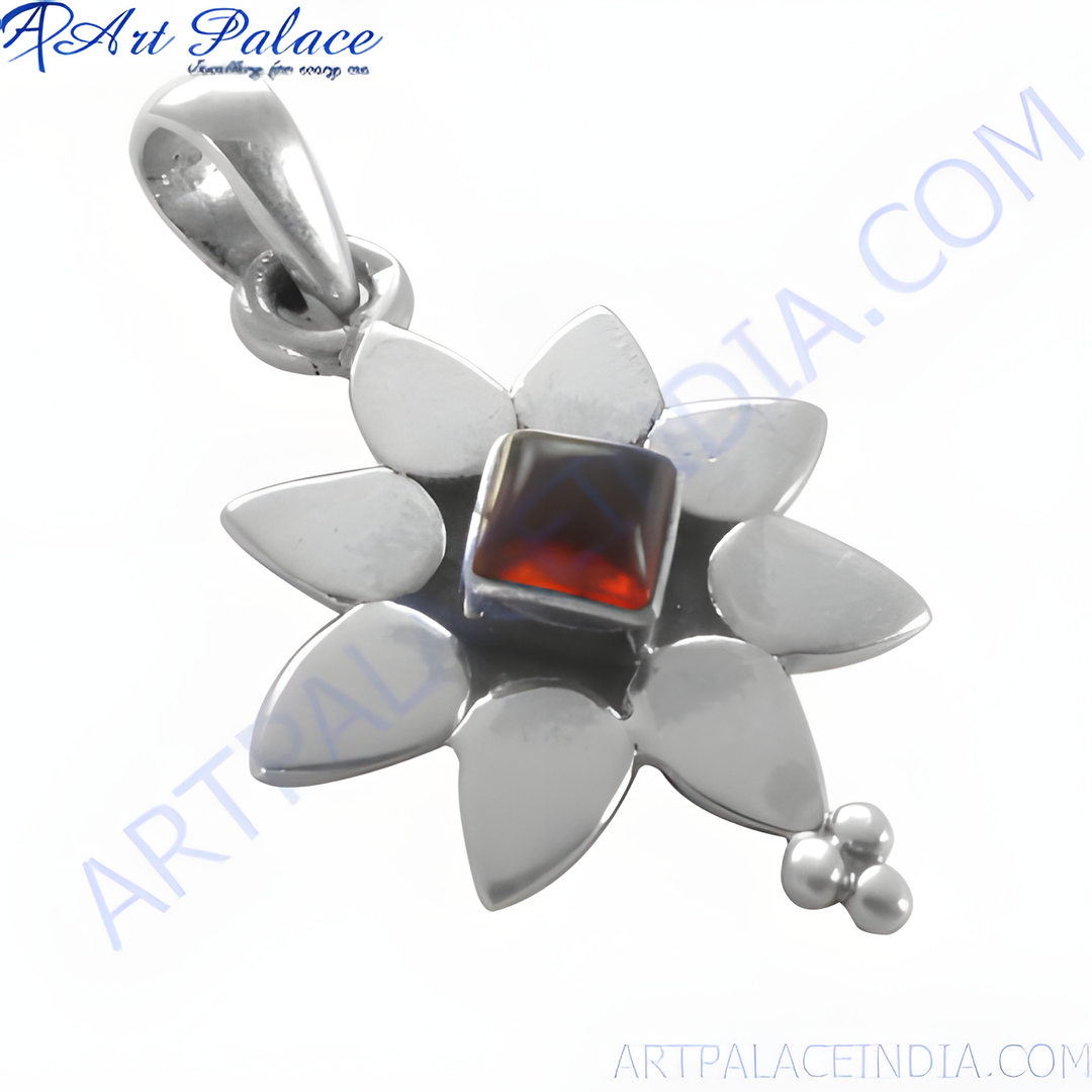 925 sterling silver flower pendant with a square-cut, dark red garnet gemstone center