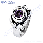 Load image into Gallery viewer, Sterling silver ring with a large round purple amethyst gemstone set in a unique design.
