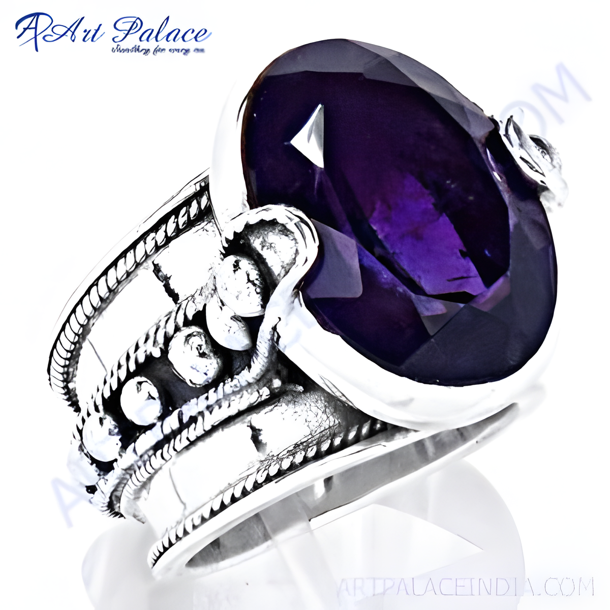 Sterling silver ring with a large oval cut purple amethyst gemstone
