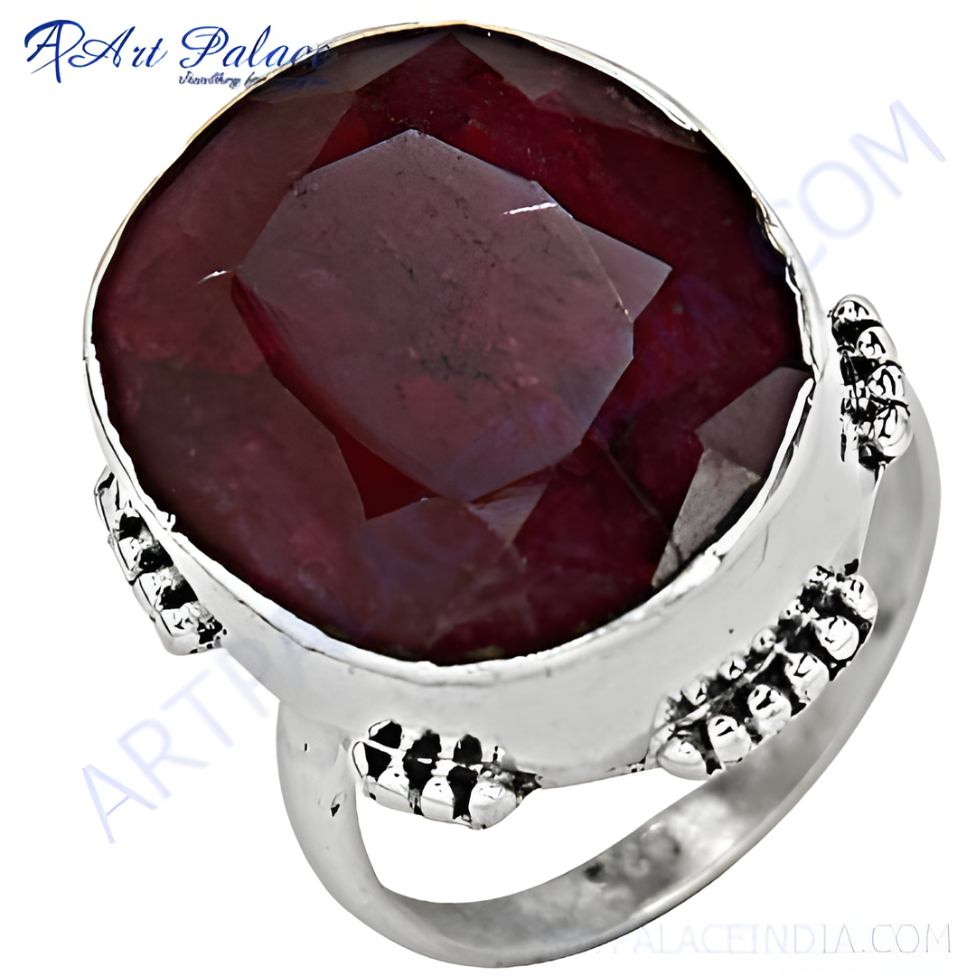 925 sterling silver ruby ring with a large, faceted red gemstone.
