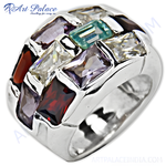 Load image into Gallery viewer, Silver statement ring featuring a mosaic of colorful gemstones including purple, red, white, and green stones.
