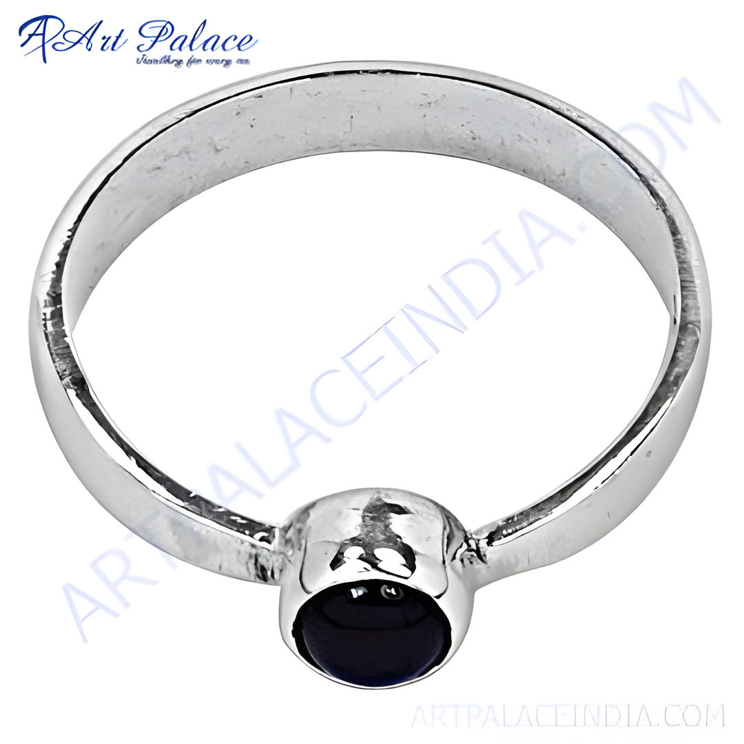 Sterling silver ring with a polished, black onyx gemstone center, perfect for daily wear.