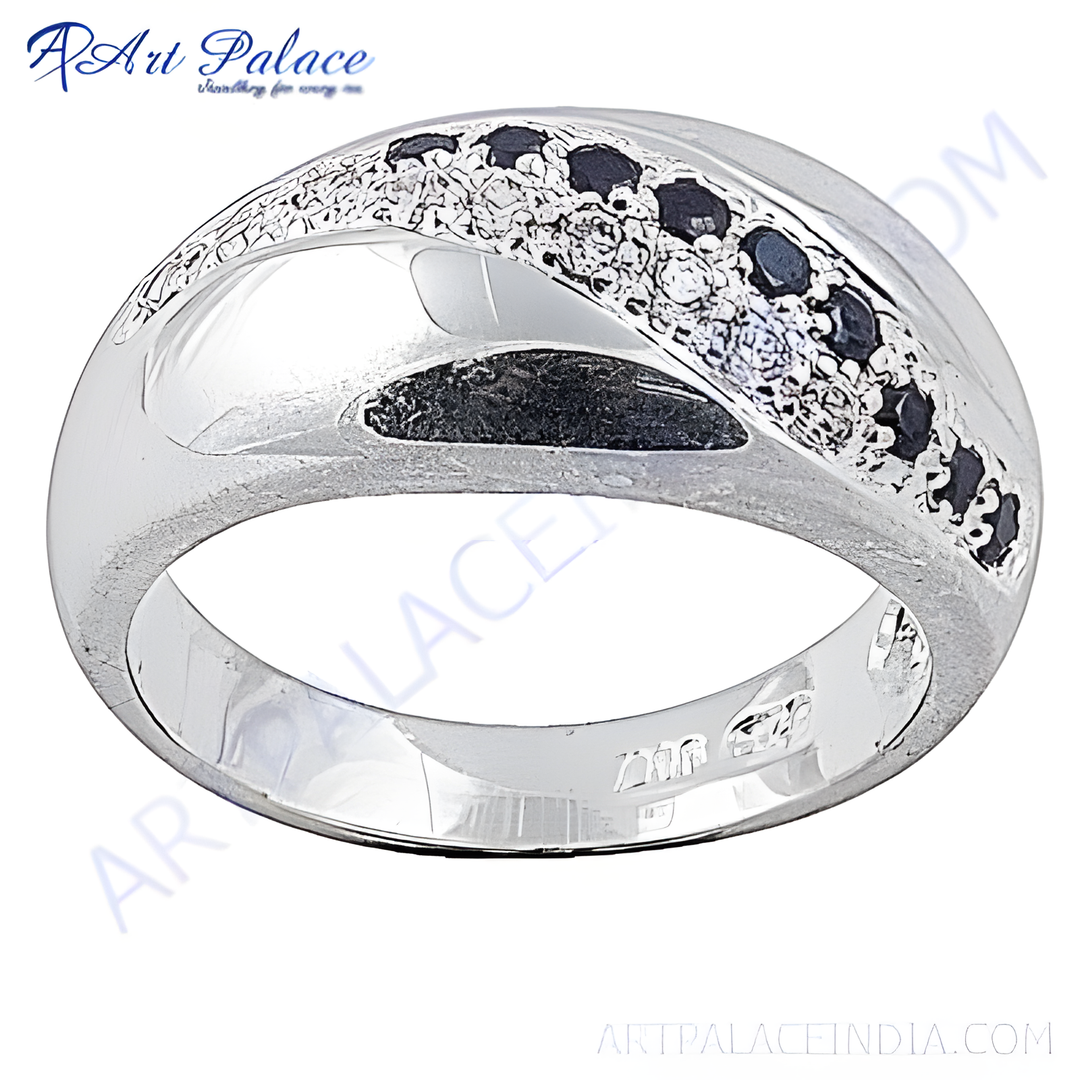 A sterling silver ring with black stones, perfect for adding a touch of elegance and sophistication to any outfit
