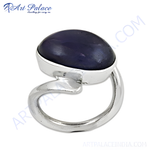 Load image into Gallery viewer, Sterling silver ring featuring an oval-shaped, dark blue gemstone; a stunning piece of jewelry.
