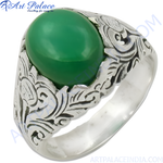 Load image into Gallery viewer, Sterling silver ring with a large oval green gemstone, intricate details on the band, perfect for men's fashion.
