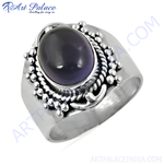 Load image into Gallery viewer, 925 sterling silver ring with a large purple gemstone center and ornate silver detailing.
