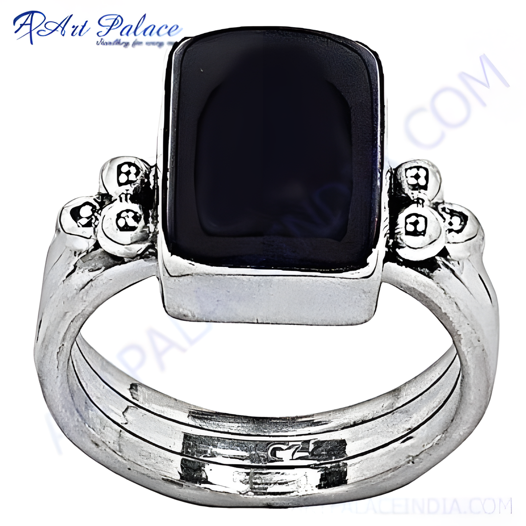 Sterling silver ring with a large rectangular black onyx gemstone.