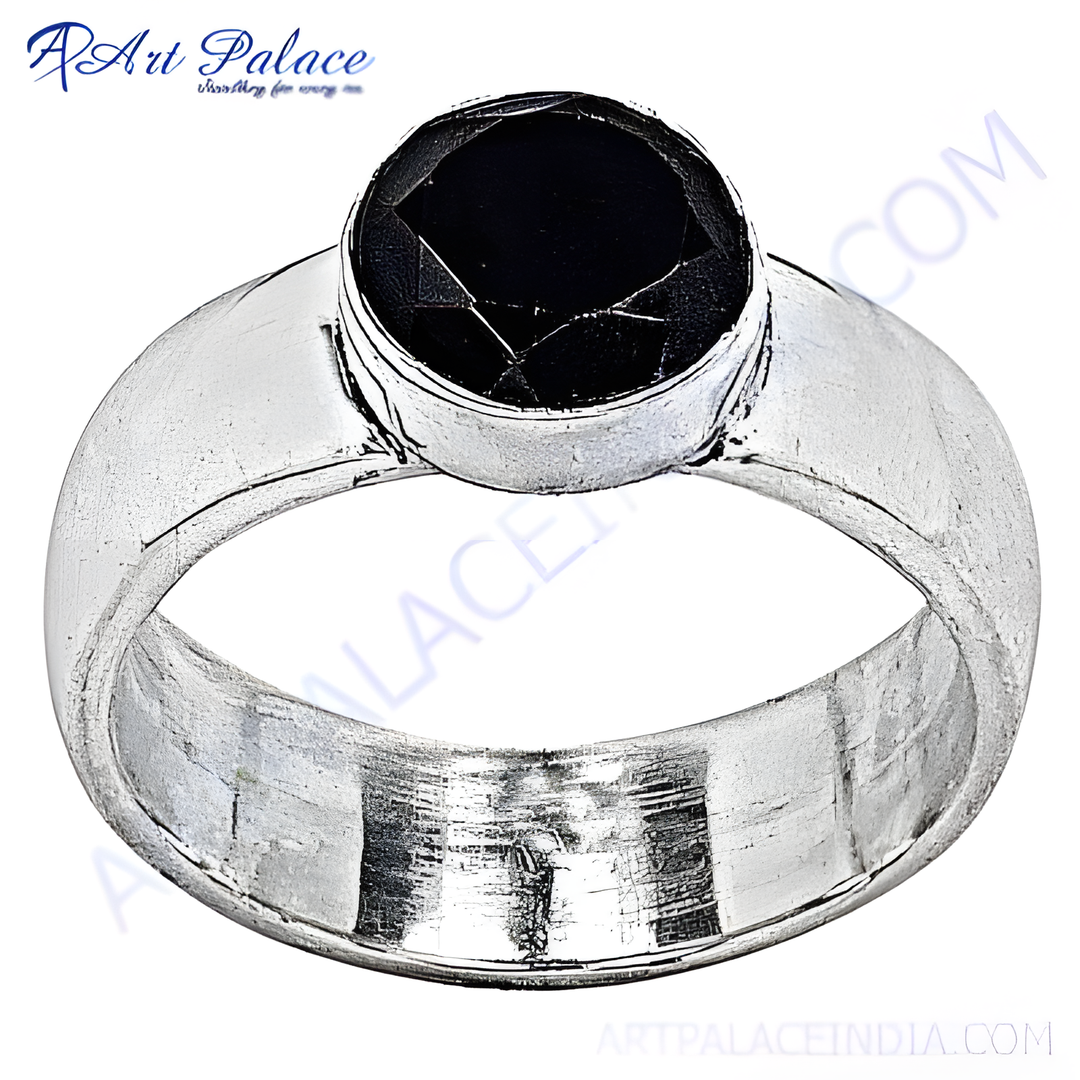 Sterling silver ring with a large, faceted black onyx gemstone.