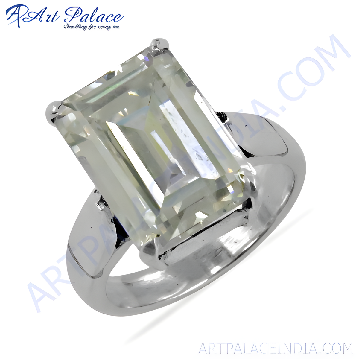 A stunning silver ring featuring a large, rectangular emerald cut gemstone