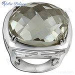 Load image into Gallery viewer, Silver ring with a large, faceted, clear gemstone set in a polished silver band
