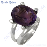 Load image into Gallery viewer, Sterling silver amethyst ring featuring a large, oval-cut purple gemstone.

