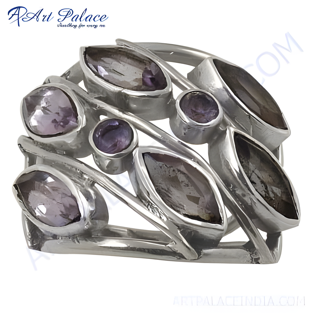 Sterling silver ring with multiple amethyst gemstones arranged in a unique leaf-like design.