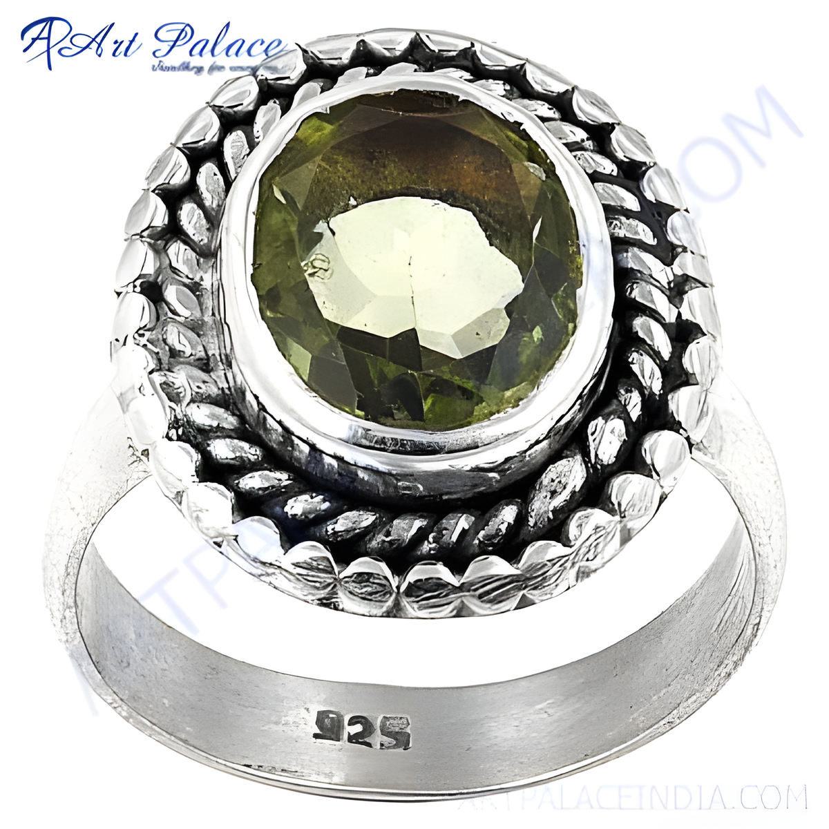 Sterling silver ring with a large, round green peridot gemstone, showcasing a detailed design around the stone