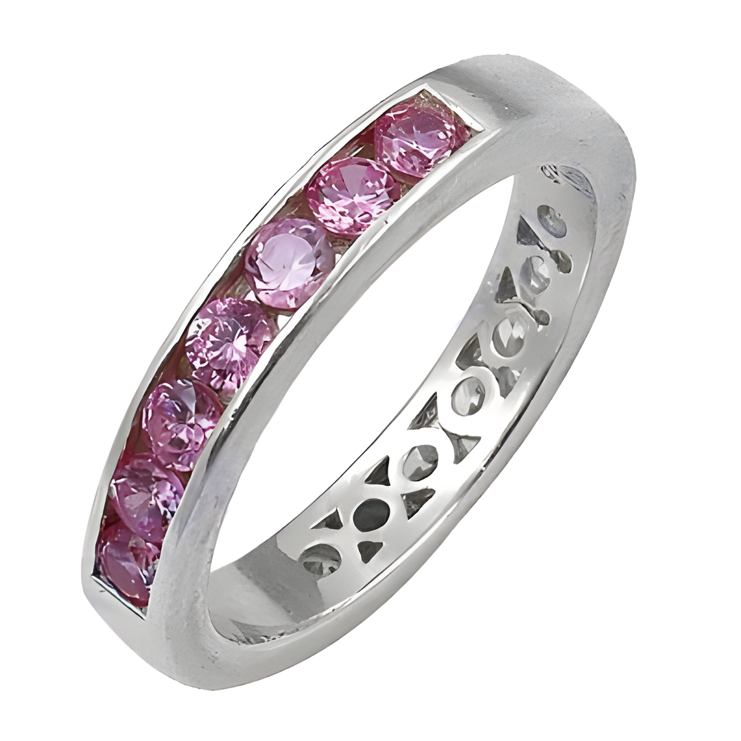 Sterling silver ring with channel-set pink sapphires, a beautiful gemstone jewelry piece.