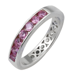 Load image into Gallery viewer, Sterling silver ring with channel-set pink sapphires, a beautiful gemstone jewelry piece.
