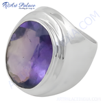Load image into Gallery viewer, Sterling silver ring featuring a large oval-cut purple amethyst gemstone. A beautiful statement piece for women.
