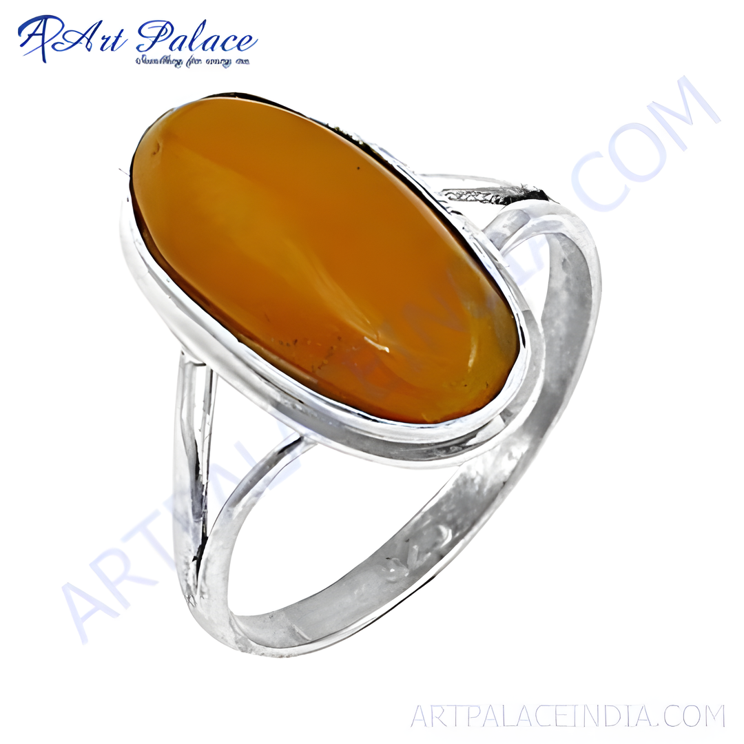 925 sterling silver ring with a large oval amber gemstone in a polished setting. The amber stone is a warm, gold platingen color.