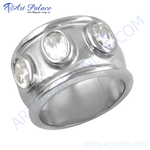 Load image into Gallery viewer, Silver ring featuring three round, clear cubic zirconia stones.
