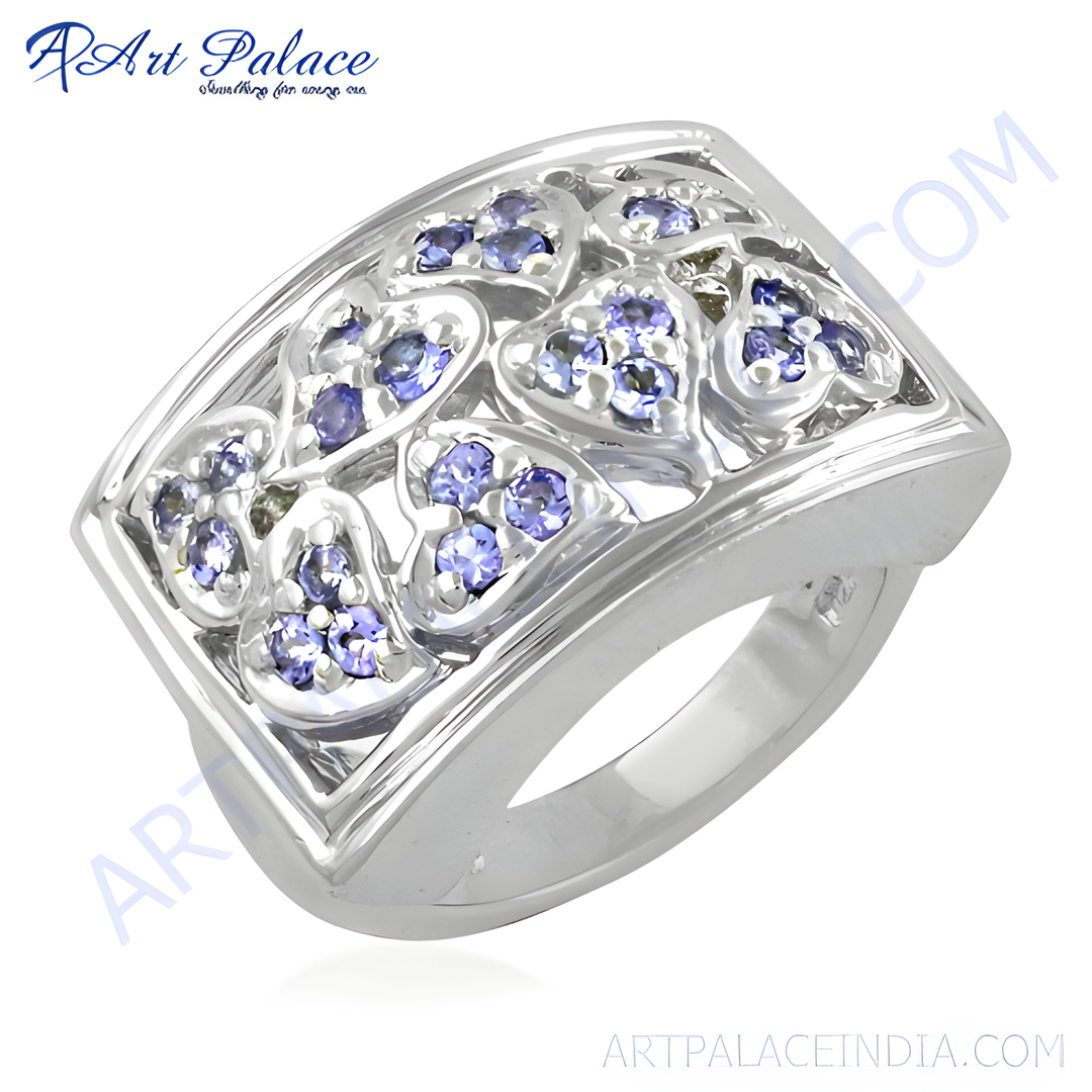 Sterling silver ring with heart-shaped tanzanite gemstones in a silver band. Beautiful gemstone jewelry.