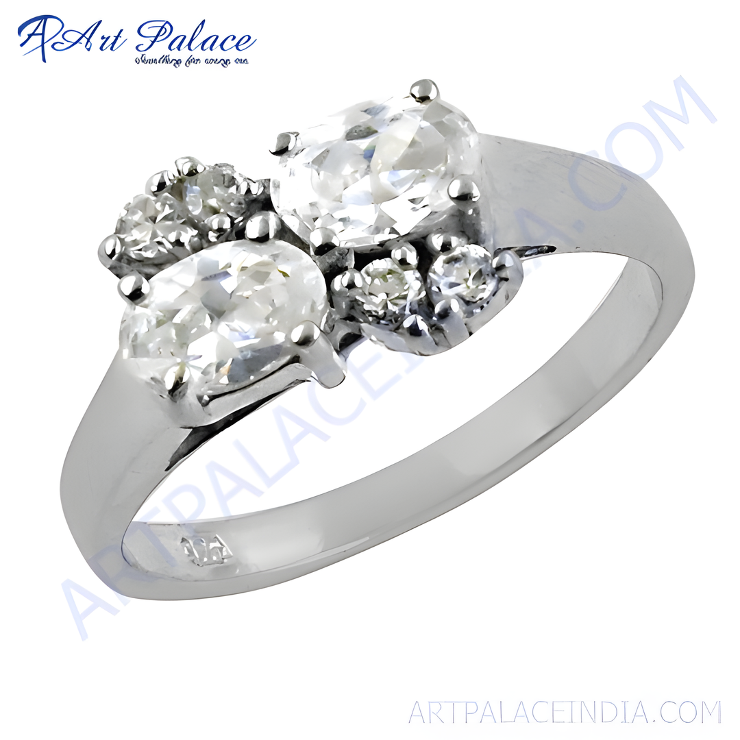 Silver cluster ring with oval and round cut diamonds. A beautiful diamond engagement ring for women.