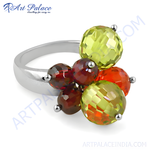 Load image into Gallery viewer, Sterling silver cocktail ring with a cluster of vibrant gemstones in green, orange, and red colors.
