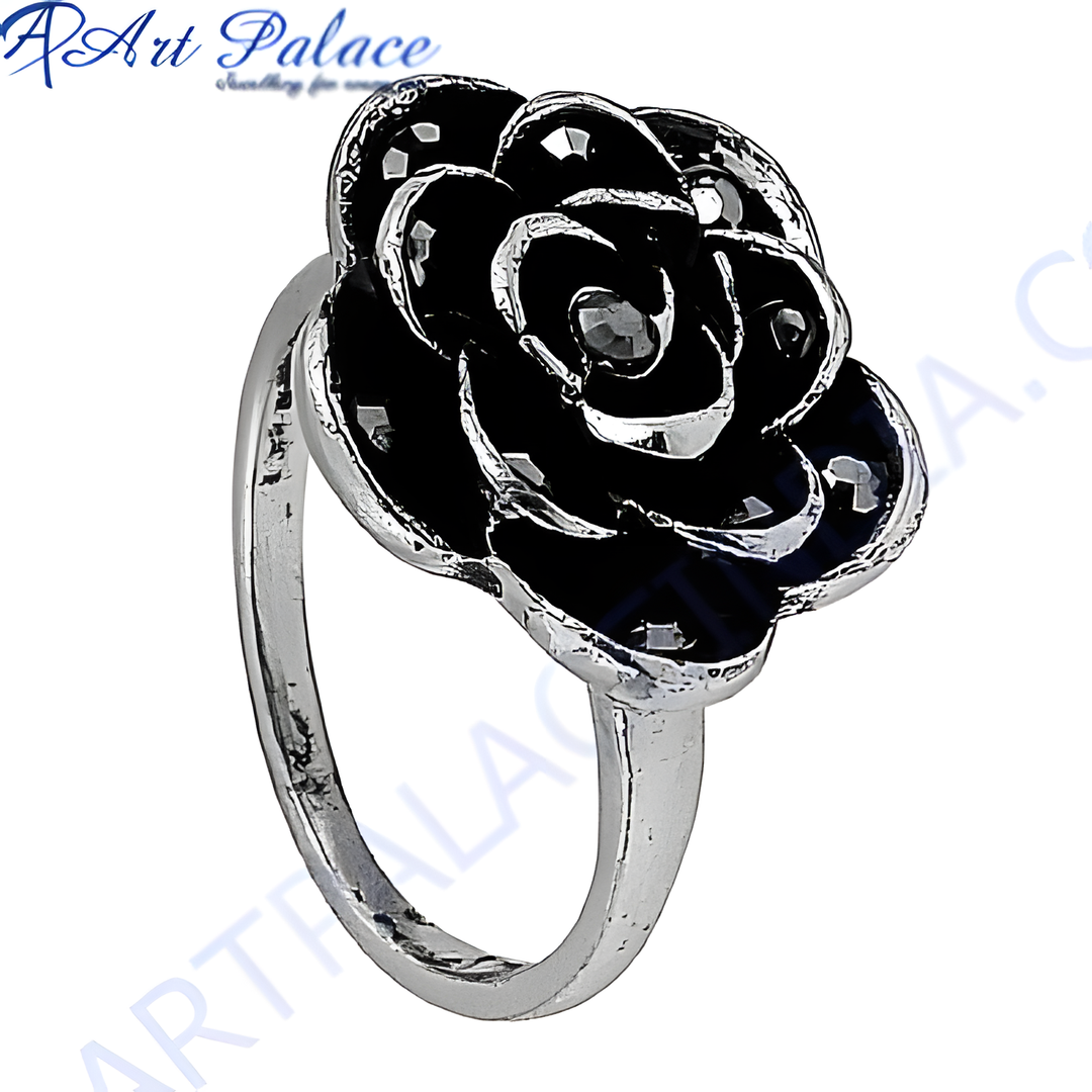 Silver ring with black enamel rose flower design
