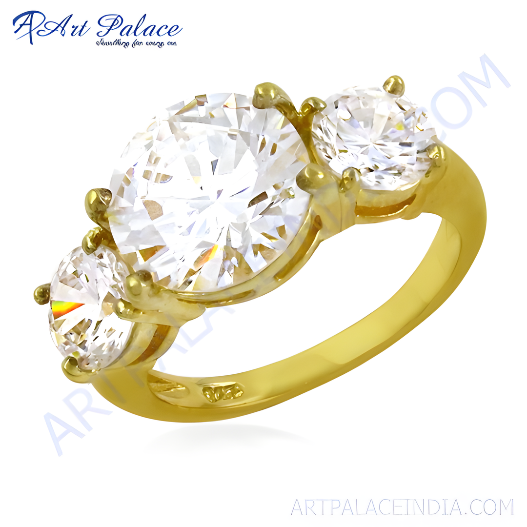 gold plating ring with three sparkling cubic zirconia stones.