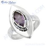 Load image into Gallery viewer, Sterling silver ring with a marquise-shaped amethyst gemstone in a statement design, purple color
