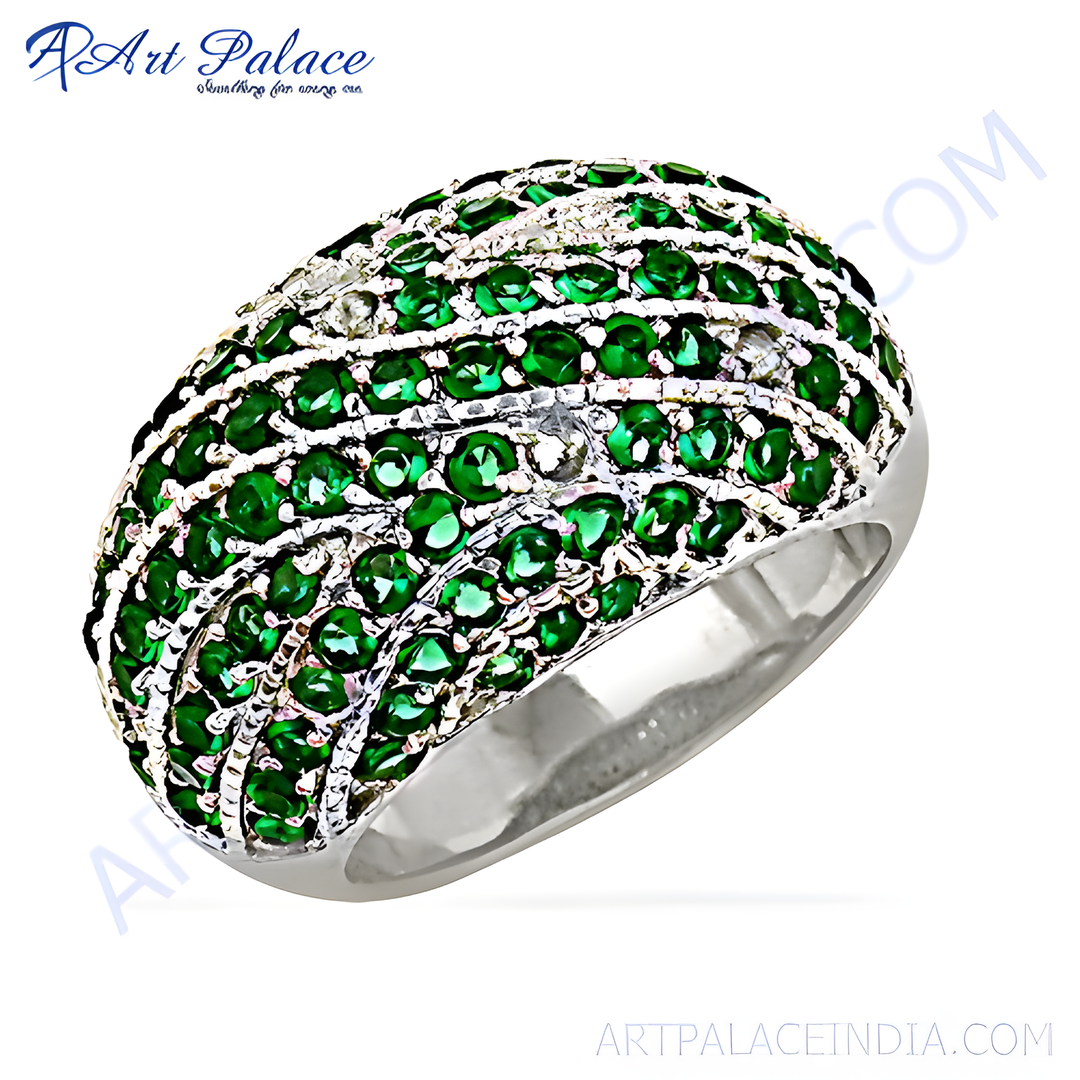 Sterling silver cocktail ring with round-cut, vibrant green gemstones, perfect for special occasions or daily wear.