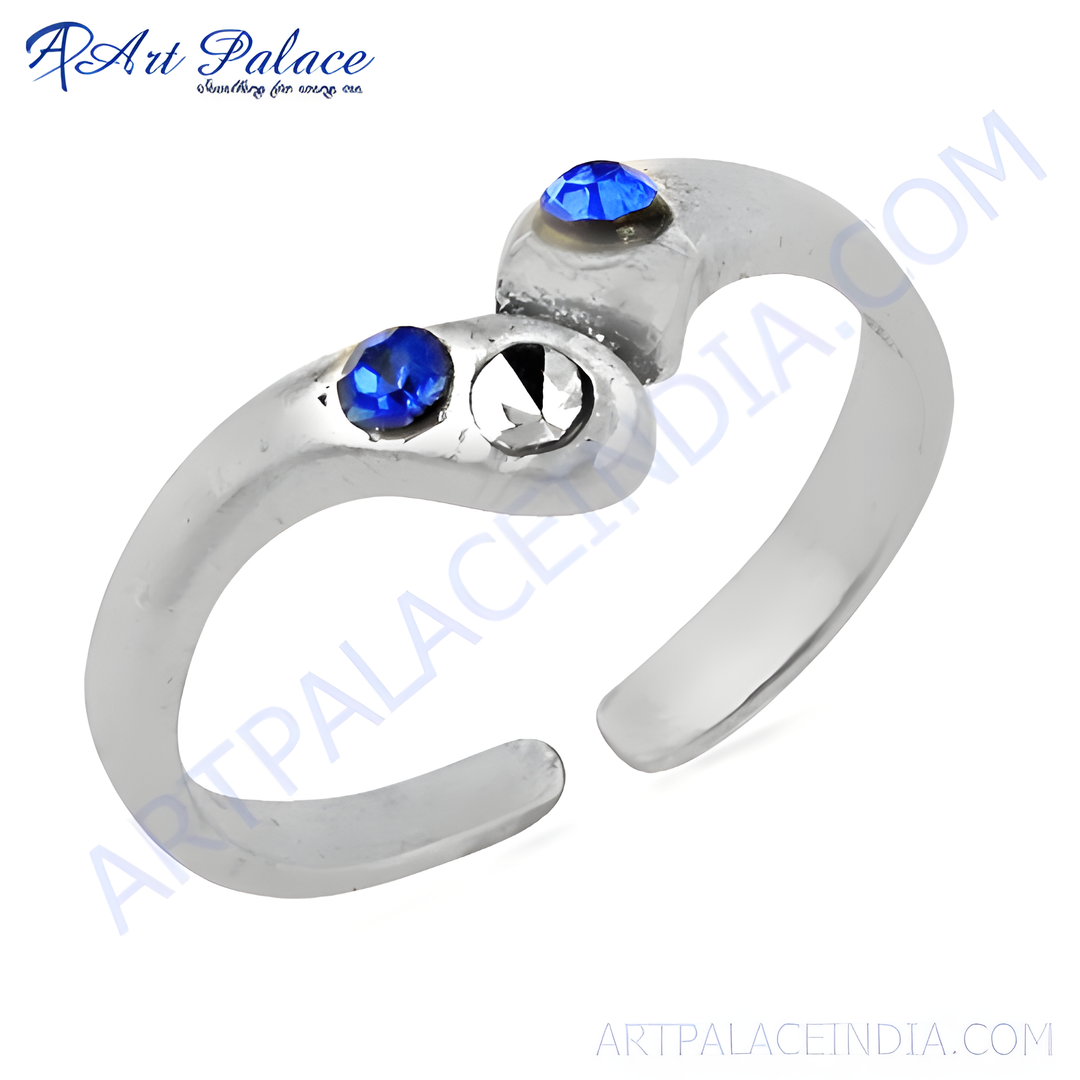 Sterling silver toe ring featuring blue gemstones. A delicate and stylish ring for women.