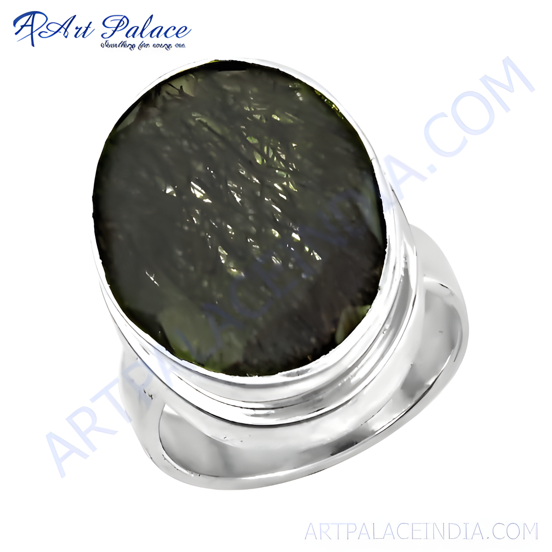 Sterling silver ring with a large oval-cut green gemstone, perfect for women.